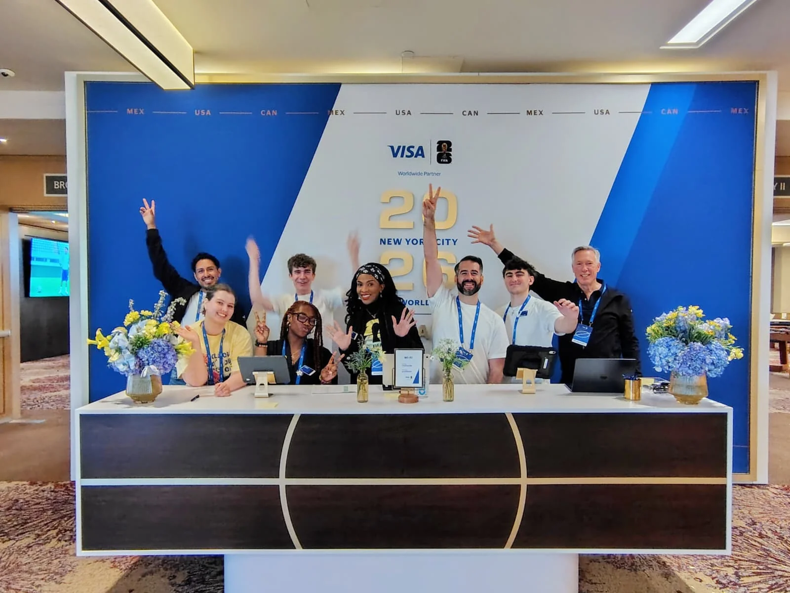Hospitality team at the Visa FIFA World Cup welcome and check-in desk