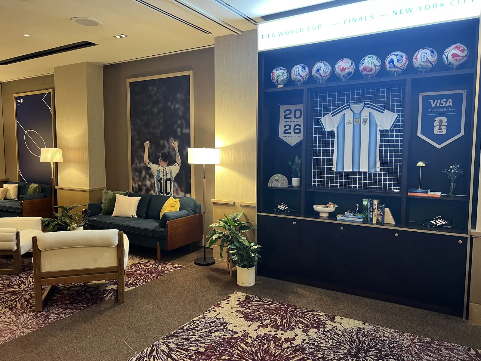 Visa FIFA World Cup VIP hospitality lounge with Argentina jersey display and guest seating